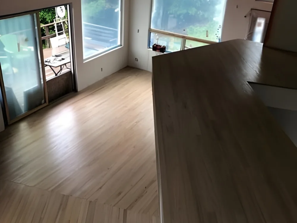 Hardwood floor refinishing viewed from upper level